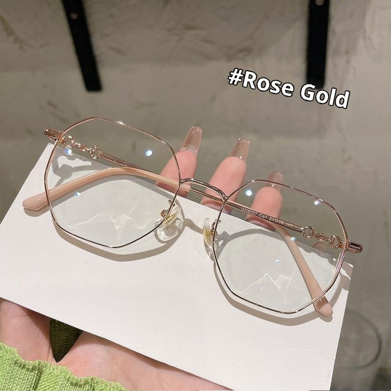 Gafas de mujer anti-luz azul con montura poligonal sin marco en oro rosa