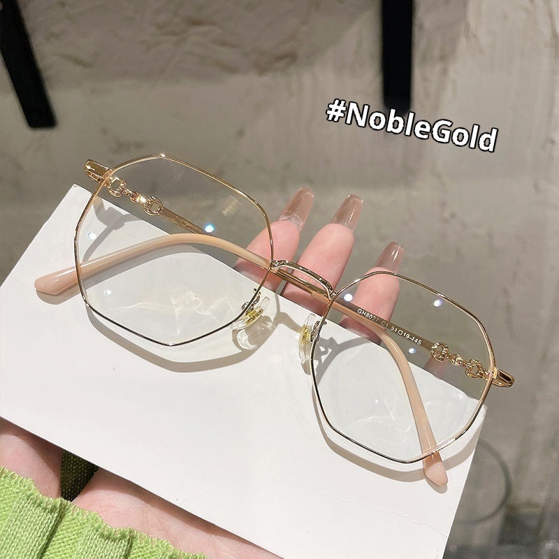 Gafas de mujer anti-luz azul con montura poligonal sin marco en oro rosa