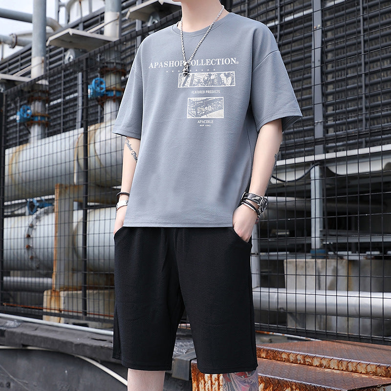 Ropa deportiva para hombre, estilo casual, tendencia, camiseta de manga corta para estudiantes coreanos, conjunto holgado y elegante de dos piezas.