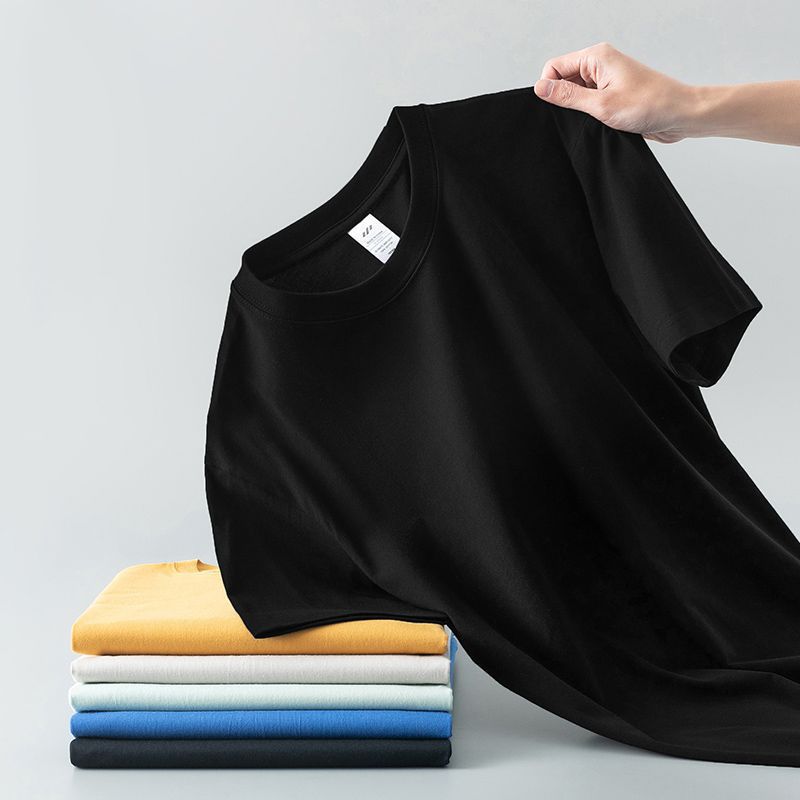 Camiseta de verano de color liso con cuello redondo y manga corta de algodón puro para hombre y mujer.