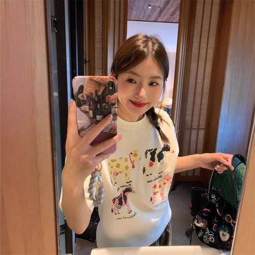 Top holgado y versátil con estampado de dibujos animados retro americanos, versión coreana