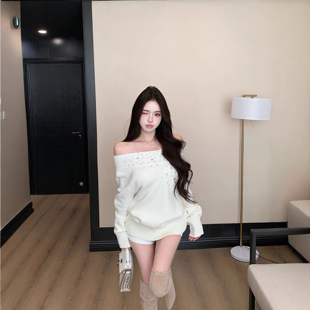 Suéter de manga larga muy adornado con pedrería