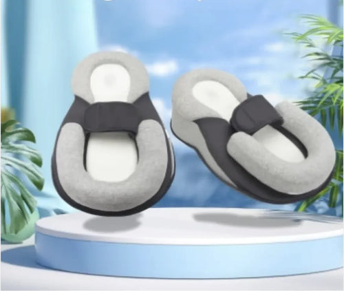 Almohada antiescupiciones para bebés