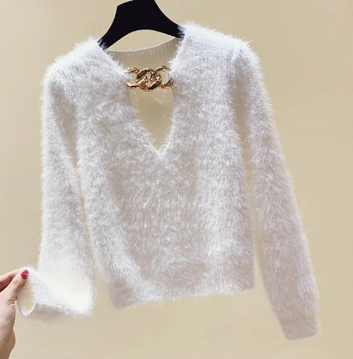 Suéter corto de punto negro con detalle de cadena para mujer